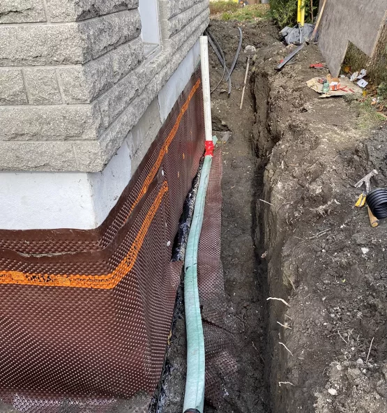 french drain pipe house border 555x592